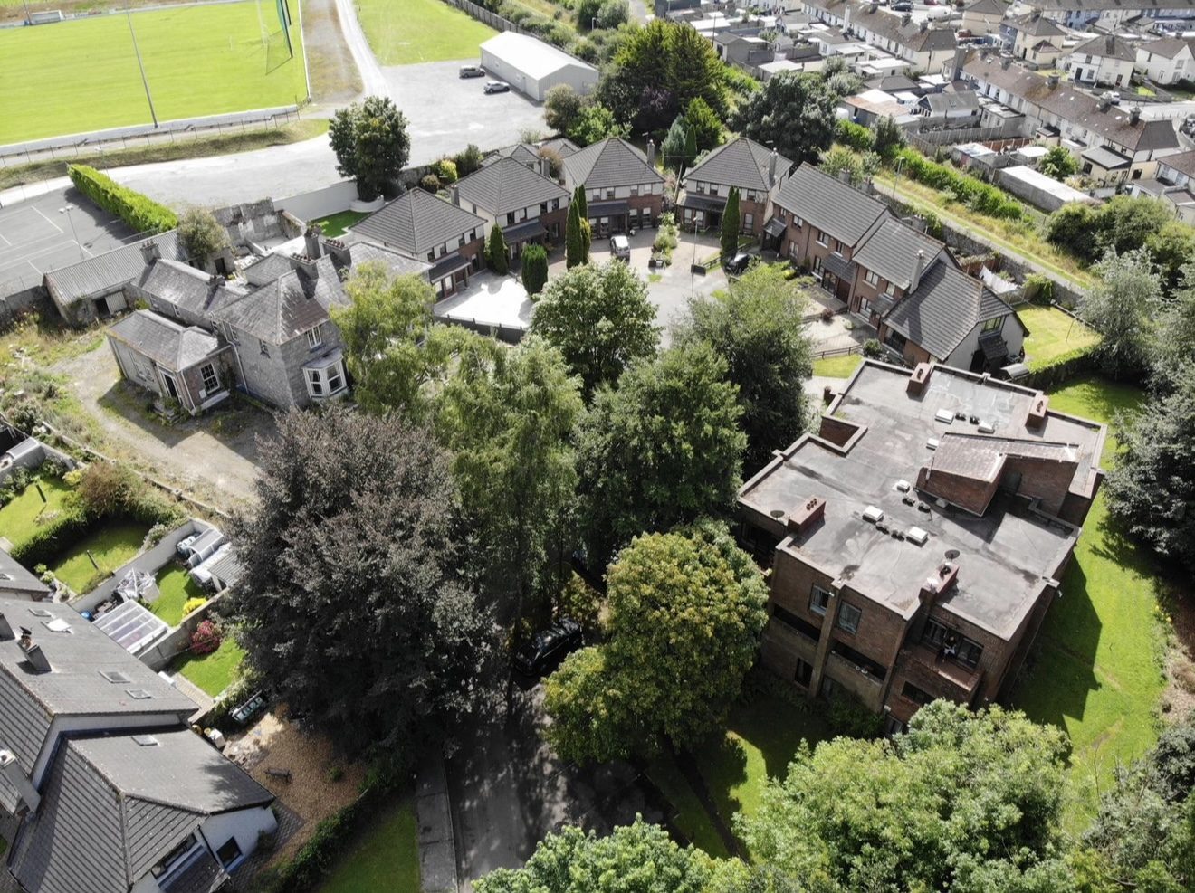 Aerial view of The Moorings surrounded by mature trees